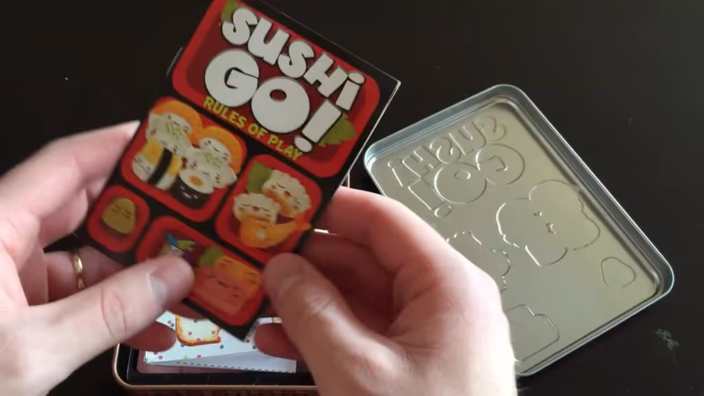 Sushi Go! card game rules and tin box