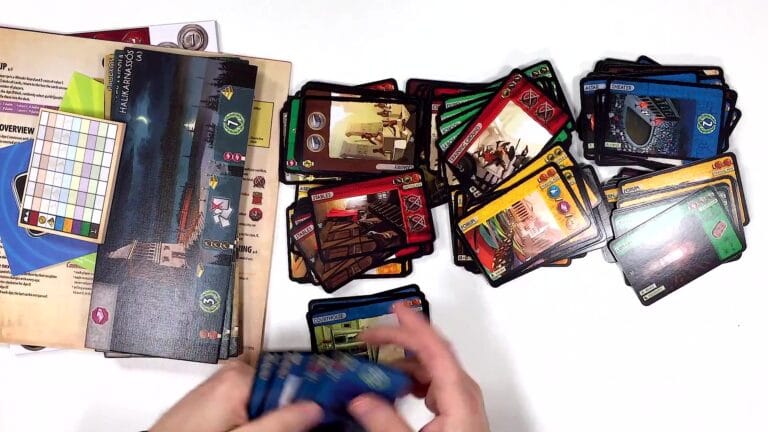 A photograph of the 7 Wonders board game setup, showing various cards and game components spread out on a table.
