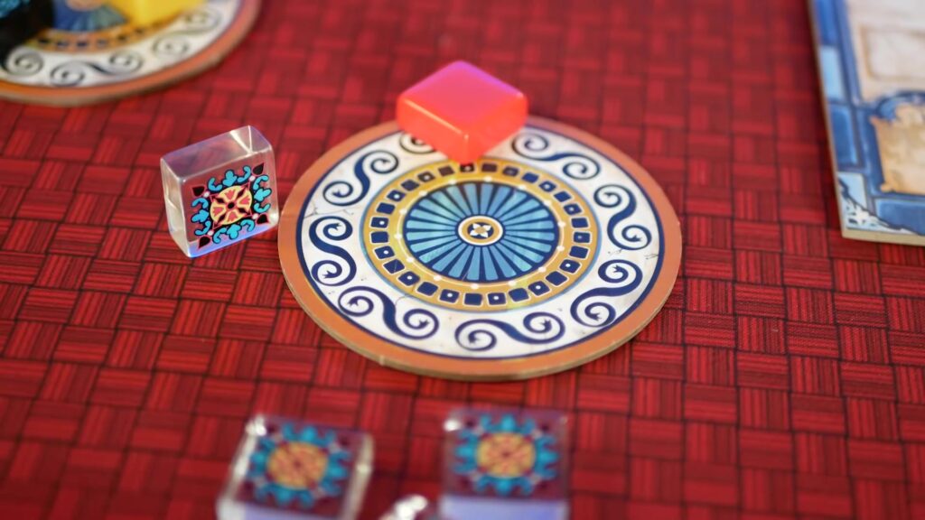 Close-up of Azul factory display with tiles.