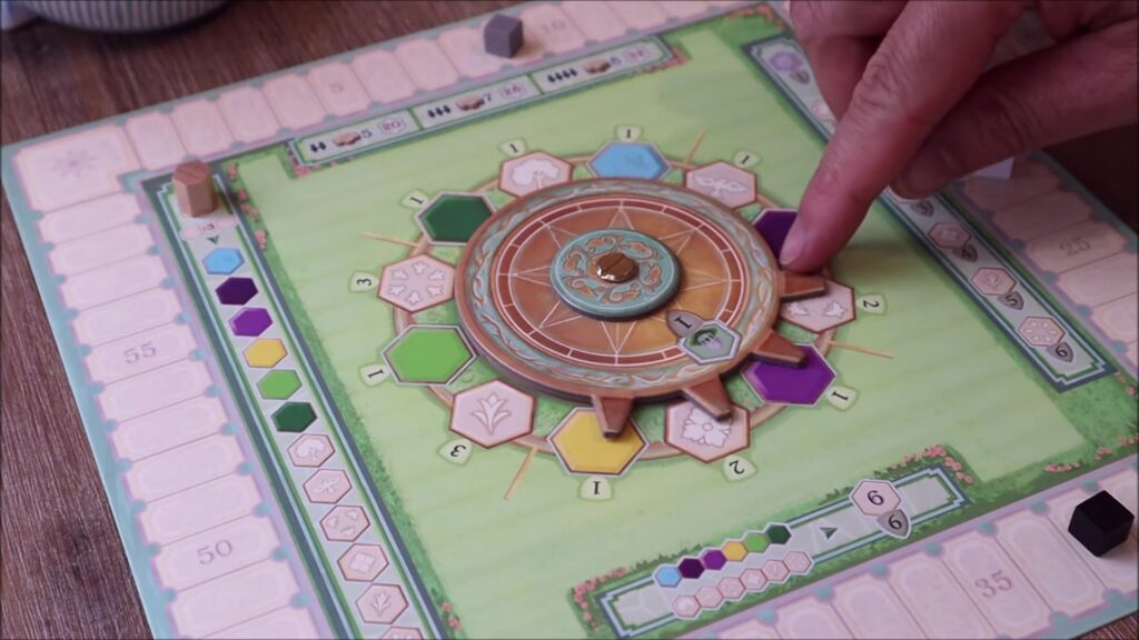 Player placing a tile on the game board.