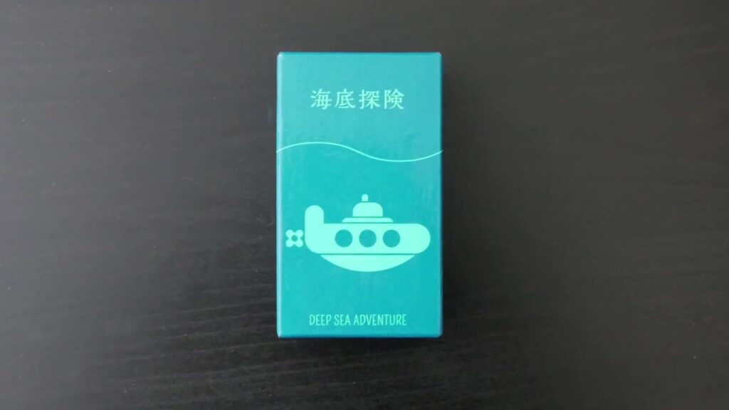 Deep Sea Adventure card game box featuring a submarine illustration