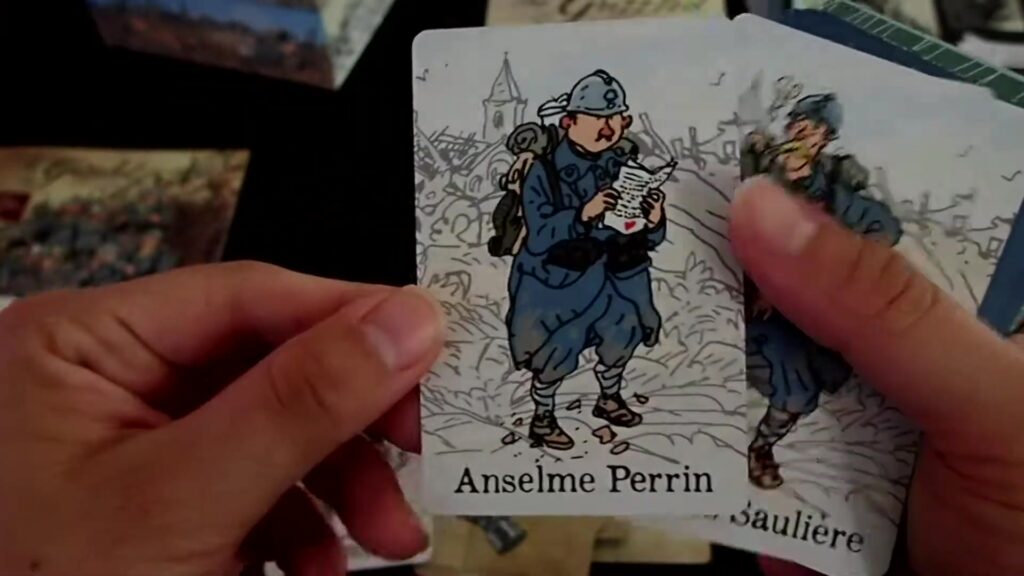 cards from the board game "The Grizzled," featuring illustrated soldiers with names "Anselme Perrin" and a partially visible second card.
